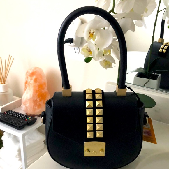 Brand new Valentino genuine leather bag w/studs